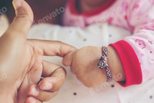Preview: Mother With Her Newborn Baby Care Hands