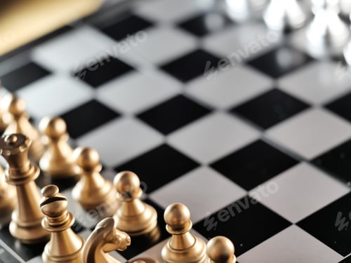 Preview: A Closeup Shot Of Metallic Golden Chess Pieces