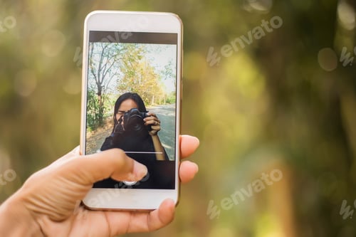Preview: Holding A Mobile Phone