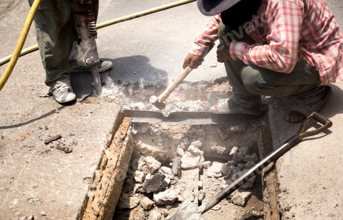 Preview: Worker Working On The Road Site Demolishing Asphalt With Pneumatic Plugger Hammer