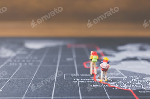 Preview: Miniature People Backpacker Walking On World Map, Tourism And Travel Concept