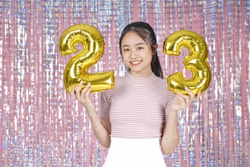 Preview: Asian Young Teenager Pretty Cheerful Beautiful Girl With Party Gold Foil Balloon, On Pink Sparkling