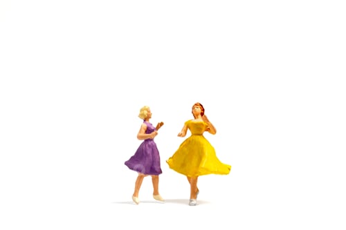 Preview: Miniature People Lesbian Couple Dancing On White Background , Homosexual Relationship Concept