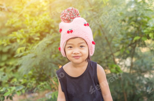 Preview: Little Cute Asian Girl Standing Among The Purple Flower Field Sunshine Day. Freedom Enjoying With