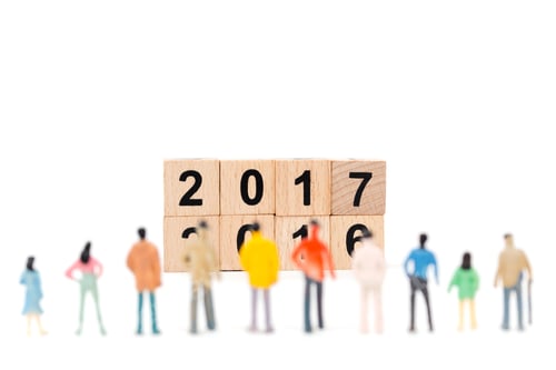 Preview: Group Of Miniature People Watching Calendar On White Background