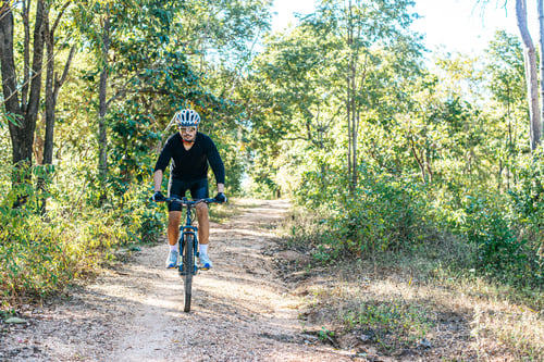 Preview: Cyclist Riding The Bike On The Beautiful Spring Mountain Trail