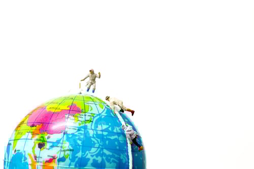 Preview: Miniature People: Hikers Climbing Up On The Globe . Sport And Leisure Concept.