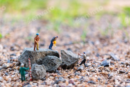 Preview: Miniature People : Worker Team Working On The Rock , Team Work Concept