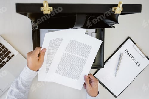 Preview: Insurance Agent Consultant Working With Data Report Documents