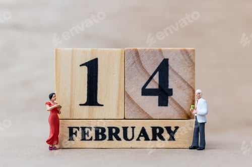 Preview: Miniature People Couple With Wooden Block 14 Feb On Wooden Background, Happy Valentines Day Concept