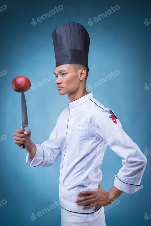 Preview: A Portrait Of An Asian Executive Chef In His White Uniform And Apron, Without His Hat On Blue