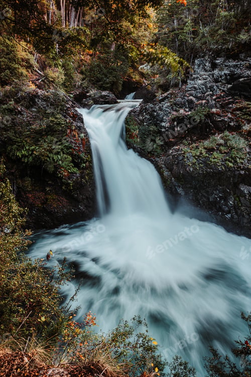 Preview: A Long Exposure Shot Of A Waterfall In The Woods