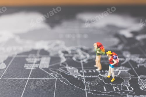Preview: Miniature People Backpacker Walking On World Map, Tourism And Travel Concept