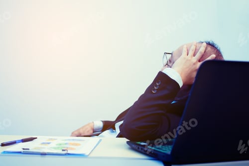 Preview: Businessman Thinking And Doing Plan In Office ; Feeling Worried And Tired On Business Unsuccessful