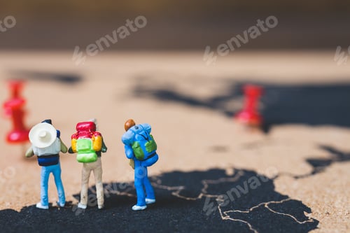 Preview: Miniature People Backpacker Walking On World Map, Tourism And Travel Concept