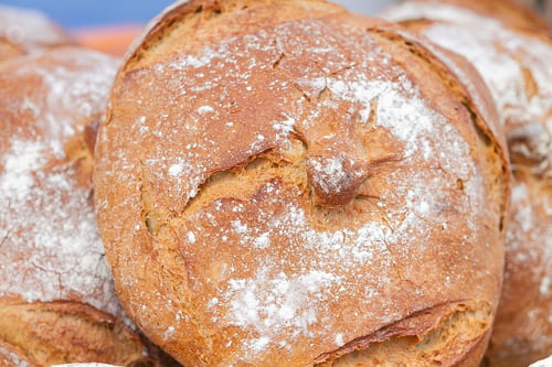 Preview: A Closeup Shot Of Galician Rustic Bread For Sale At The Market