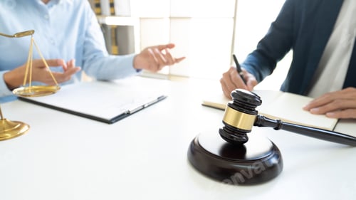 Preview: Lawyer Consultant Discussing With Client About Legal And Justice.