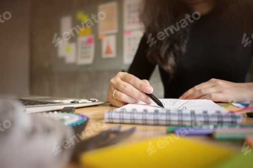Preview: Fashion Designer Stylish Drawing At A Studio