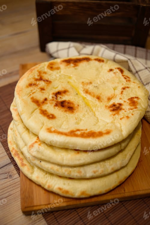 Preview: A Vertical Shot Of Dough Pies With Feeling