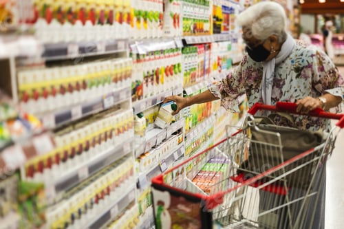 Preview: Old Woman Wearing A Protective Mask In Food Shopping Store During Covid-19