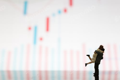 Preview: Miniature Figures Couple Standing On A Graph Chart