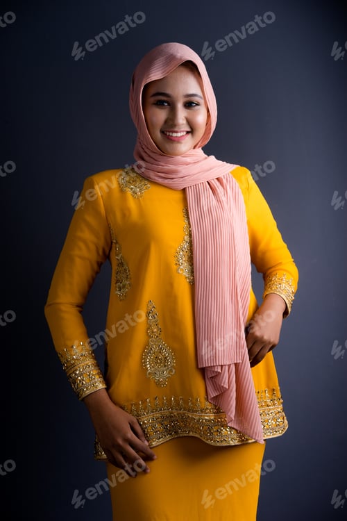 Preview: Beautiful Female Muslim Model In Yellow Modern Kurung, A Modern Lifestyle Apparel On Grey