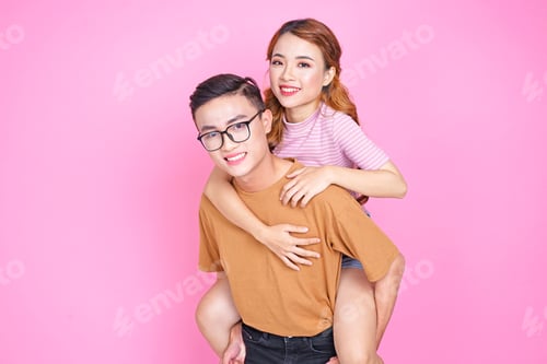 Preview: Asian Young Lovely Cute Couple With Handsome Guy And Beautiful Girl On Pinky Background