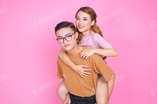 Preview: Asian Young Lovely Cute Couple With Handsome Guy And Beautiful Girl On Pinky Background