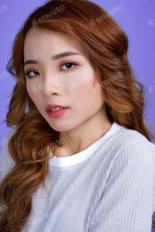 Preview: Portrait Of Beautiful Attractive Sexy Asian Girl On Purple Background