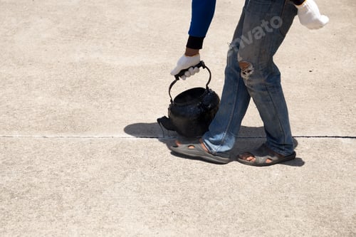 Preview: Worker Is Pouring Asphalt For Road Repair In Day Time