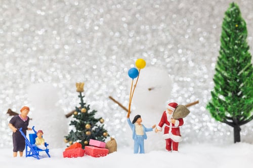 Preview: Miniature People: Santa Claus And Kids With Snow Background . Christmas And Happy New Year Concept.