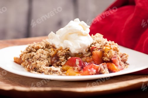 Preview: A Closeup Shot Of Homemade Plum And Peach Crumble Or Cobbler With Whipped Cream
