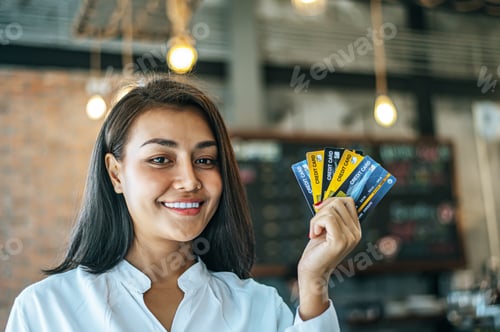 Preview: Young Women Enjoy Shopping With Credit Cards.