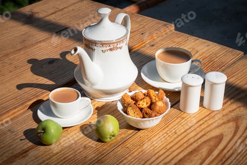 Preview: A Closeup Shot Of Tea Time With Snacks In White Cutlery Set In Manali, Himachal Pradesh