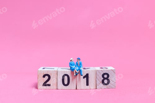Preview: Miniature People : Couple Sitting On Wooden Block Number 2018 , Valentine'S Day Concept