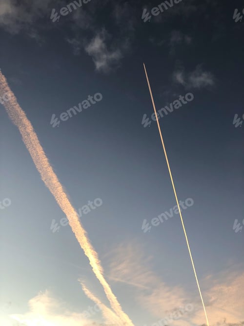 Preview: The Contrails Of An Airplane Up In The Sky