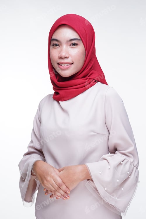 Preview: A Beautiful Muslim Female Model In A Cream Colored Modern Kebaya With Red Hijab, An Asian Muslim