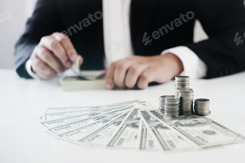 Preview: Businessman Using The Calculator About Investment Plan Funds And Banking Concept.