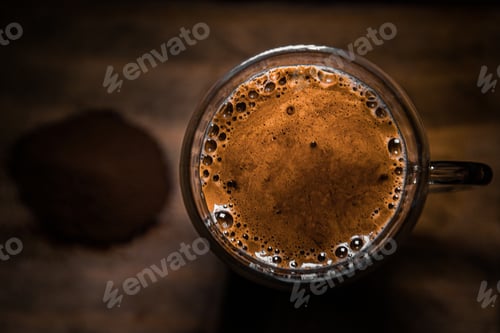 Preview: A Closeup Of A Cup Of Black Coffee