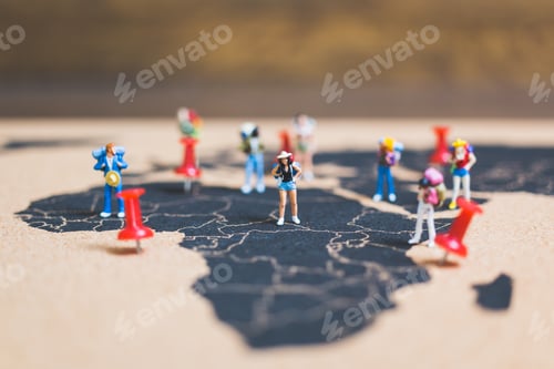 Preview: Miniature People Backpacker Walking On World Map, Tourism And Travel Concept