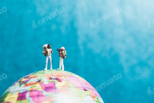 Preview: Miniature Backpacker , Travelers With Backpack Standing On World Map And Walking To Destination