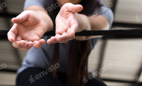 Preview: Young Woman Victim Hand Reach Out For Help From A Metal Bars