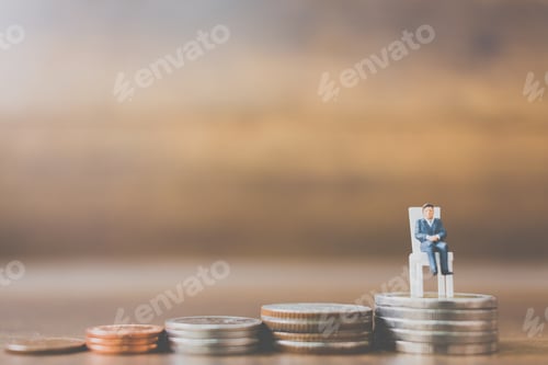 Preview: Miniature People Businessman On Coins And Space For Text