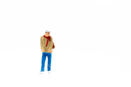 Preview: Miniature People Standing On White Background And Space For Text