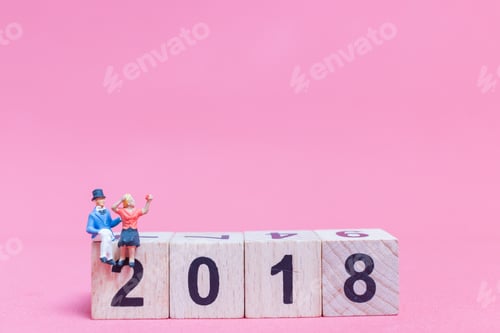 Preview: Miniature People : Couple Sitting On Wooden Block Number 2018 , Valentine'S Day Concept