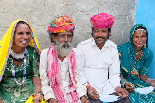 Preview: A Group Of Indian People In National Costumes Wearing Face Masks During The Covid-19 Pandemic