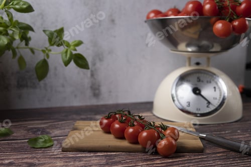 Preview: Weighed Red An Fresh Cocktail Tomatoes Before Cutting In Small Pieces