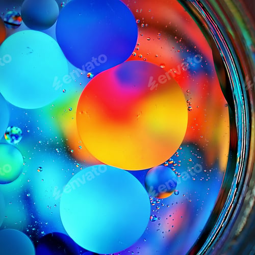 Preview: A Closeup Of Colorful Out Of Focus Bubbly Circles In A Jar For Background Or Wallpaper