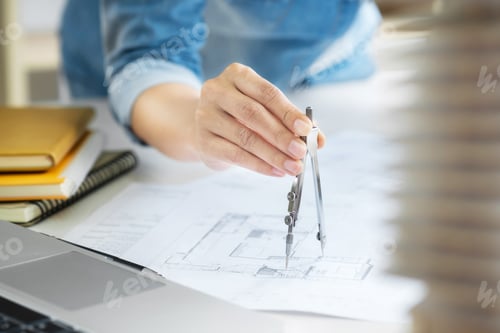 Preview: Close Up Interior Architect Working On Blueprint With Engineering Tools
