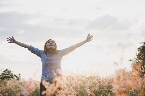 Preview: Young Beautiful Woman Standing Stretch Her Arms In The Air On The Grass Field. Woman Enjoy With